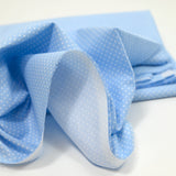 Cotton stung printed pea blue background