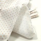 Piqué de coton imprimé coeur camel fond blanc