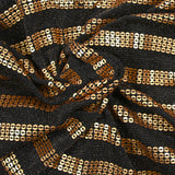 Maille bisous et sequins dorés fond noir