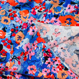 Viscose imprimée brouillard de fleurs fond bleu