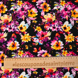 Viscose imprimée danse de fleurs rose et orange fond noir