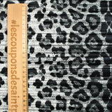 Maille plissée imprimée léopard fond noir et gris