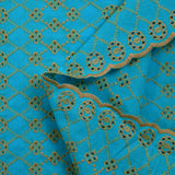 Beige scalloped English embroidery Clémence azure blue background