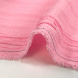 Crépon de polyester effet seersucker rose clair