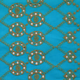 Beige scalloped English embroidery Clémence azure blue background