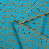 Broderie anglaise festonnée beige Éléonore fond bleu azur