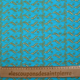 Broderie anglaise festonnée beige Éléonore fond bleu azur