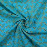 Broderie anglaise festonnée beige Éléonore fond bleu azur