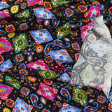 Viscose imprimée cachemire fuchsia et bleu fond noir