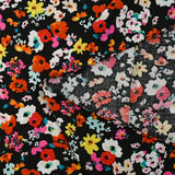 Viscose imprimée explosion de fleurs fond noir