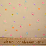 Printed cotton small colorful flowers beige background