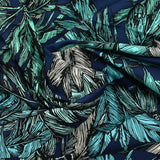Algodón estampado de palmeras con fondo marino