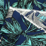 Algodón estampado de palmeras con fondo marino
