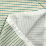 Cotton printed with turquoise churrant stripes light beige background