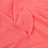 Muselina de poliéster con pequeños azulejos rojos y blancos