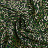 Punto fino lurex plisado leopardo dorado fondo rojo, verde y azul