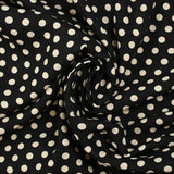 Viscose imprimée à pois 8mm écru fond noir