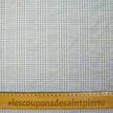 Crinkled checkered cotton sky and taupe white background