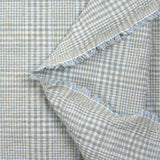 Crinkled checkered cotton sky and taupe white background