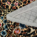 Matelassé imprimé bijoux fond léopard