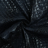 Matelassé imprimé reptile fond bleu marine