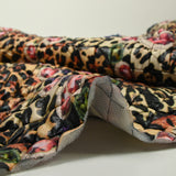 Matelassé imprimé bijoux fond léopard