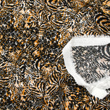 Crépon viscose lurex imprimé sauvage noir et camel