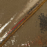 Sequins dorés sur maille chair