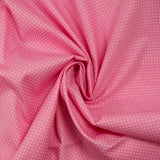 Coton imprimé pois 1mm fond rose barbie
