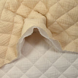 Double gaze matelassée double face beige et blanc cassé au mètre