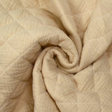 Double gaze matelassée double face beige et blanc cassé au mètre