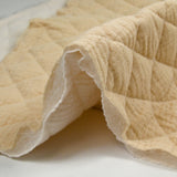 Double gaze matelassée double face beige et blanc cassé au mètre