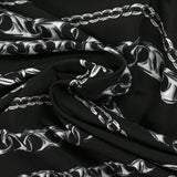 Maille de viscose satinée imprimée en chaîne fond noir