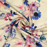 Maille de viscose satinée imprimée un air floral fond crème