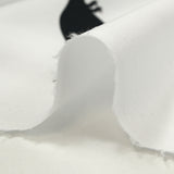 Coton imprimé dinosaure noir fond blanc