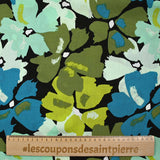 Crépon de viscose imprimé éclat de fleurs pétrole et anis fond noir