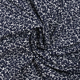 Jersey de coton imprimé branches d'arbre blanc fond bleu nuit