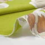 Crépon de viscose imprimé pivoine élégante fond vert anis