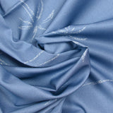 Coton imprimé palmier fond bleu lavande
