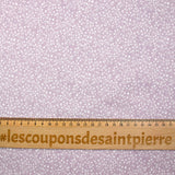 Coton imprimé mini fleurs fond parme