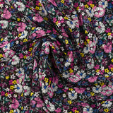 Mousseline crinkle imprimée lurex prairie fleurie magenta fond noir