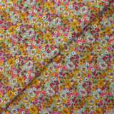 Mousseline crinkle imprimée lurex prairie fleurie rose fond vert d'eau