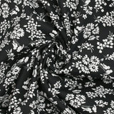 Popelina de algodón con estampado de pájaros cantores, fondo negro