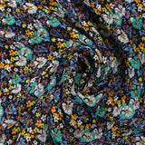 Mousseline crinkle imprimée lurex prairie fleurie turquoise fond marine