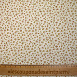 Cotton poplin printed with abstract flowers on an ecru background