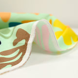 Satin de coton élasthanne botanique fond vert d'eau