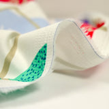 Satin de coton élasthanne visage fond blanc