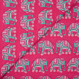 Algodón indio estampado con elefante turquesa y fondo rosa.