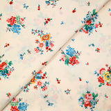 Satin polyester fin imprimé bouquet de roses fond écru