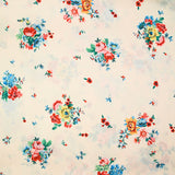 Satin polyester fin imprimé bouquet de roses fond écru